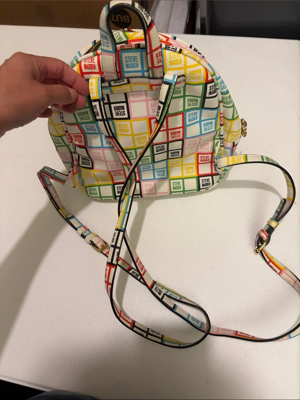 Steve Madden White Mini Backpack with Multicolor Logo Grid